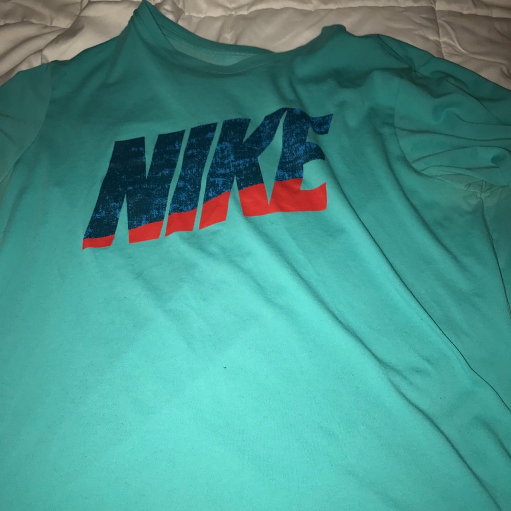 Cyan nike dri-fit shirt